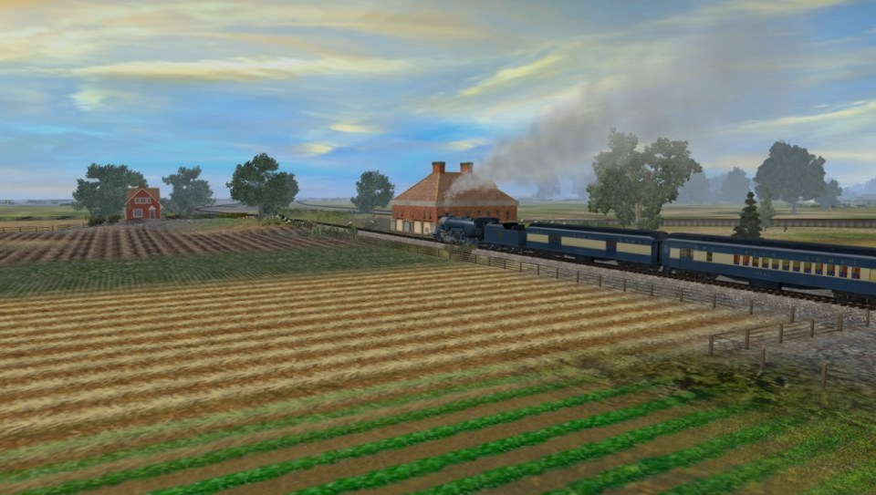 Blue Comet steaming through the farmland
